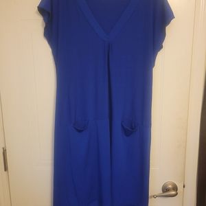 Woman's size large form fitting pocketed dress